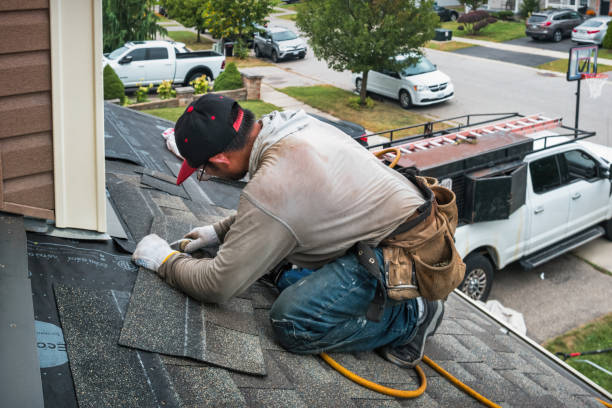 Professional Roofing technician working in Sheboygan Falls, WI